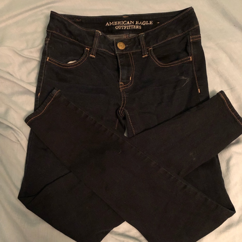 AE super stretch dark wash jegging